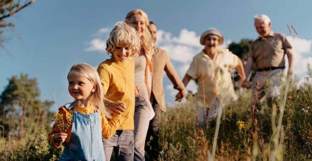 happy family walking in nature